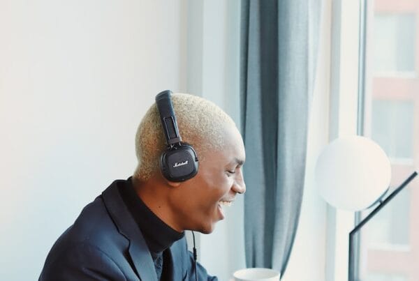 man in black jacket wearing headphones